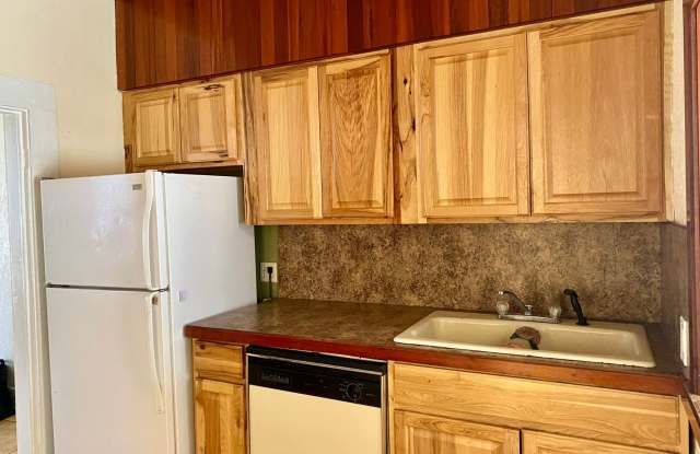 2 bedroom, 1 bathroom house, fenced yard, above downtown Gallery 4