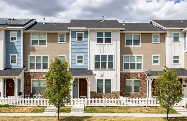 Spacious 4-Bedroom Townhome with Guest Suite, Modern Finishes & Prime Herriman Location photos photos