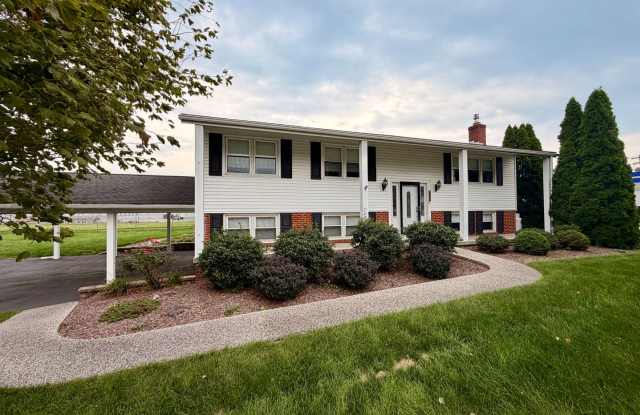 Single Family Bi-Level Home with Large Deck and Fenced Yard Gallery 1