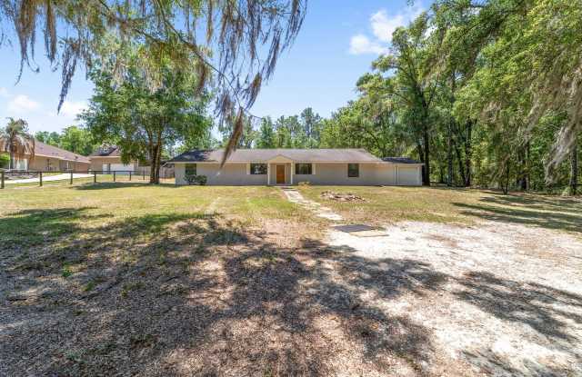 MOVE IN SPECIAL- Won't last!   Huge beautifully maintained 3-bedroom, 2-bath home offering approximately 2,380 square feet of living space on 1.16 acres in desirable Southwest Ocala. Gallery 4