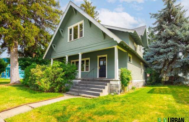 Spacious 4-Bedroom Home with 2-Car Garage, Basement Storage & Flexible Living Space in North Spokane photos photos