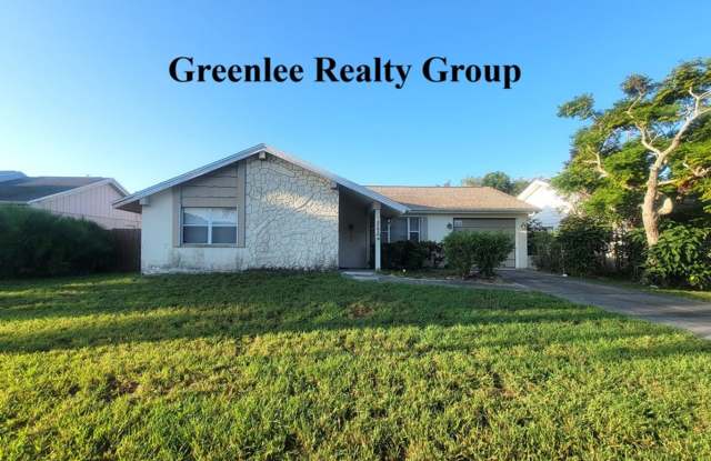 Spacious 2/2 home in Holiday—move-in ready and close to the beach! Gallery 3