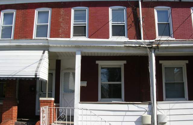 Great Home! Wood Flooring! Updated Kitchen! Wood Cabinets! Granite Counters! Great Living Space! W/D Hook-ups! Lots of Storage! photos photos