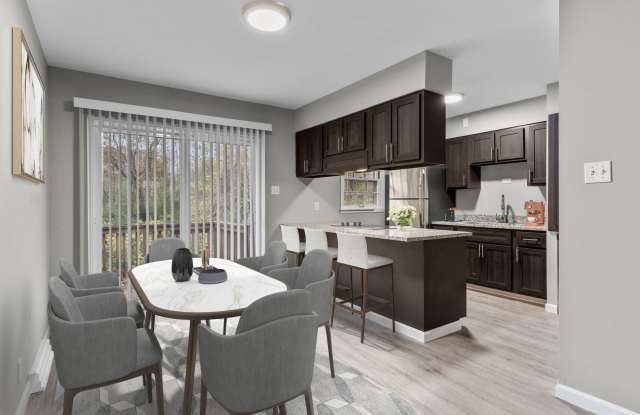 2 Bed Premium W/ Patio - GRANITE, Spacious, Natural Light, Basement! Gallery 1