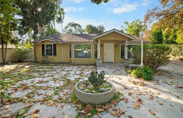 Tucked away behind gorgeous grand gates is this beautifully updated 3 bedroom 2 bath home photos photos