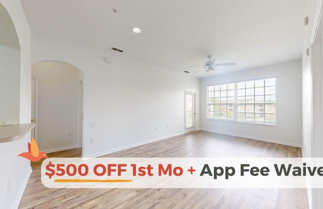 Beautifully updated 2 bed, 2 bath third-floor condo in the gated Stonebridge community. photos photos