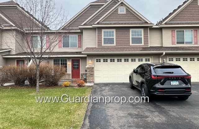 North Brooklyn Park Town Homes, Dedicated Office, 2 Car Garage, Washer/Dryer, Front Patio - 9947 Vera Cruz Lane, Brooklyn Park, MN 55443