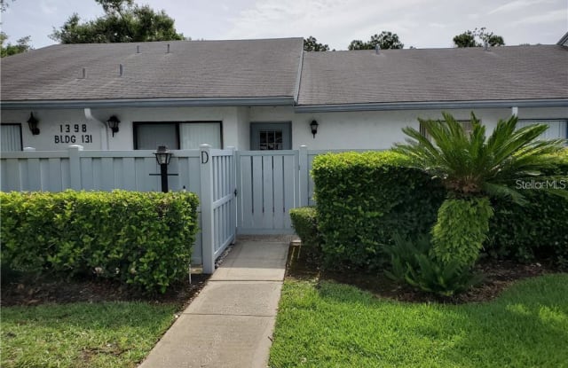 1398 PINE RIDGE CIRCLE E - 1398 Pine Ridge Circle East, East Lake, FL 34688