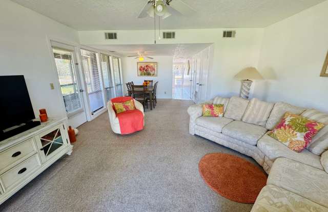 FULLY FURNISHED 2-Story Townhouse on Canal – Pool, Golf Views & ALL Utilities Included! Gallery 3
