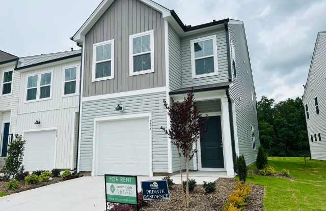 Stunning new end-unit 3 bedroom 2.5 bath townhouse in N High Point with attached garage. photos photos