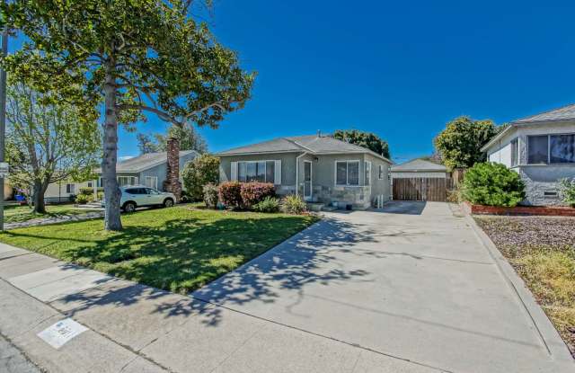 Bright & Charming, Single Story 3BR2BA Home w/ Large Front Yard, Huge Fenced Rear Yard w/ Large Driveway/Patio, Lawn Area & Dectached 2-Car Garage Close to Shopping, Freeway Access & 5 Minutes To Beach! photos photos