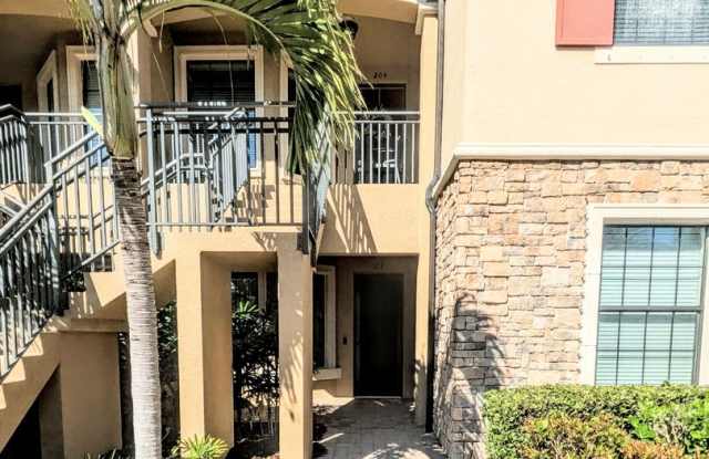 Short term turnkey furnished Incredible 2/2 with den ground floor condo in resort Esplanade Lakewood Ranch Gallery 3