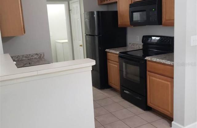 Well maintained condo in a GATED COMMUNITY with community POOL at heart of new Tampa Gallery 3