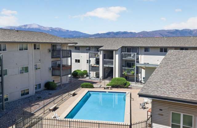 Welcome Home to Your Remodeled 2BD Top-Floor Condo w/ Pikes Peak Views – Utilities Included photos photos