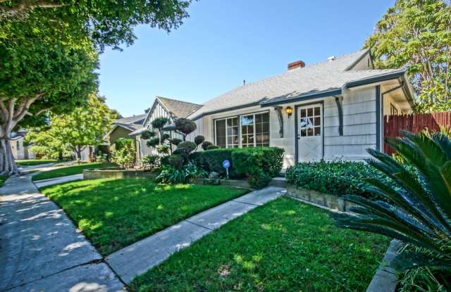Incredibly Charming  Bright 3BR2BA Home w/ Newly Remodeled Kitchen  Large Laundry Room  Detached 2-Car Garage 1 Block from School! photos photos