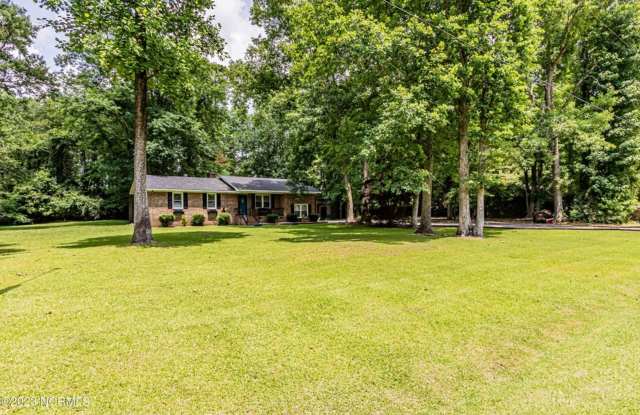 Charming Brick Ranch with Updated Kitchen & Private Backyard! Gallery 4