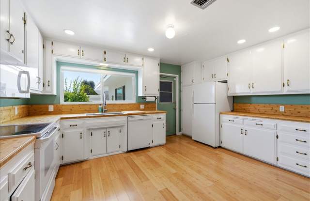 3 bed / 2 Bath Mid-Century Home with Two-Car Garage, Soaking Pool and Manicured Backyard! photos photos