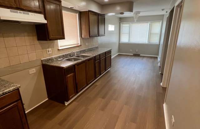 4 bed / 2 bath raised brick ranch home with a finished basement sits on a quiet block in a nice area. Gallery 4