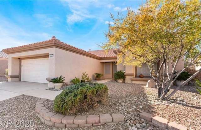 Darling home in Sun City Summerlin featuring 2 bedrooms plus a den! photos photos