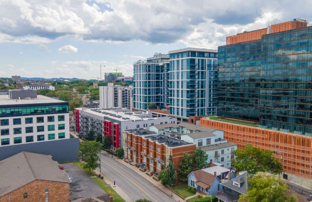 **WALKABLE MIDTOWN CONDO WITH BALCONY AND COURTYARD AND ASSIGNED GARAGE PARKING** photos photos