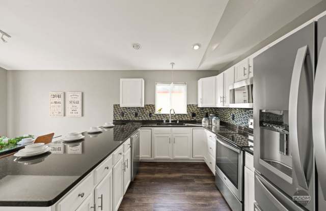 MUST SEE! | 4 BEDROOM 2.5 BATHROOM HOUSE | 3 CAR HEATED GARAGE | AVAILABLE---> Feb 28 photos photos
