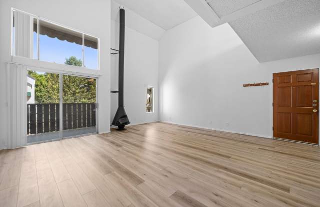 Top-Floor 1-Bedroom Condo with Vaulted Ceilings and Private Balcony photos photos