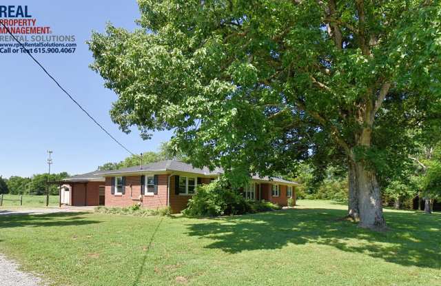 All Brick 3bd 2ba home with attached garage on a large lot! Gallery 3