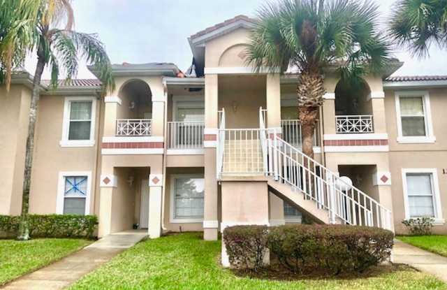 Nice 2X2 located on 2nd floor- Tile & laminate flooring! NO CARPET! Call today!! Tranquil water view from screened in back balcony!!Laundry closet with washer and dryer!! photos photos