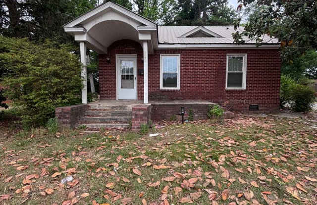 Discover this three-bedroom, one-bath single-family home in East Charlotte photos photos