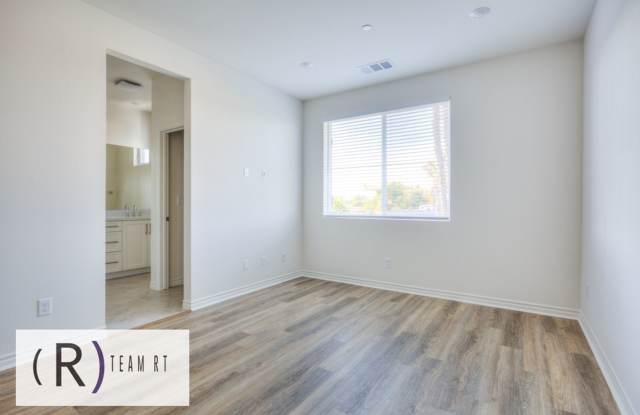 Modern 4-Bedroom Tri-Level Home with EV Charging & Solar in Artesia ! Gallery 4