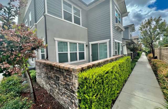 Spacious 4BR/3BA Townhome with Downstairs Bedroom & 2-Car Garage at Yorba Linda Gallery 1
