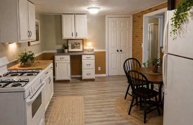 Completely Renovated 3 Bedroom, 2 Full Bathrooms! Front Porch & Detached Garage! 2 Living Rooms! photos photos
