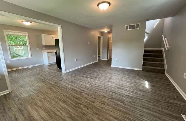 Just Renovated! New Kitchen, Floors, Paint, and more! 4 Bed, 2 Bath. Garage and Private Parking Gallery 3