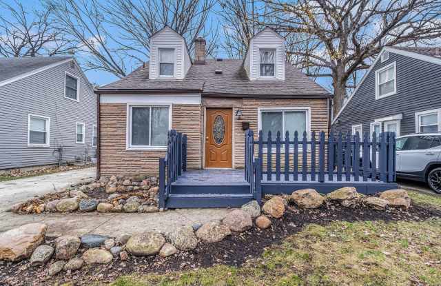 Updated Bungalow with Modern Kitchen  Fenced Yard photos photos