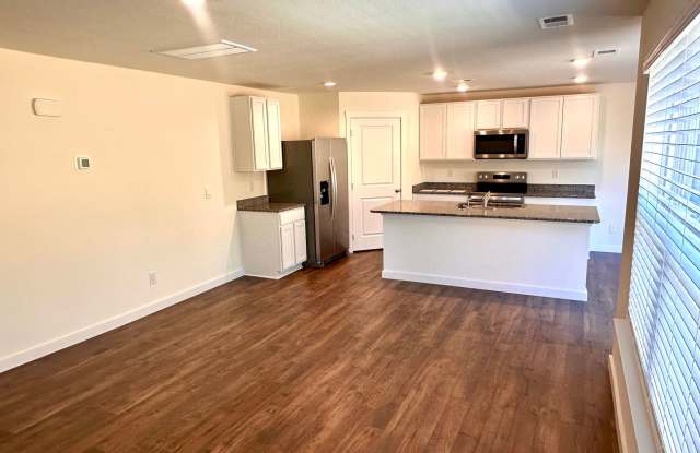 Modern 3-Bedroom Home with Fenced Backyard & 2-Car Garage Gallery 4