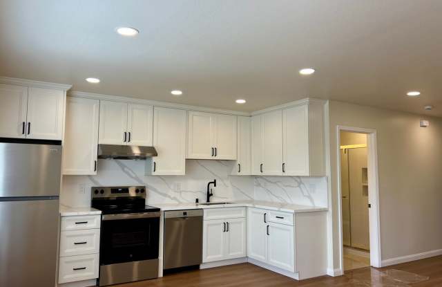 Light, bright & all NEW inside. Beautiful upgrades in this naturally bright 2 bd, 1 ba unit with a huge garage. photos photos