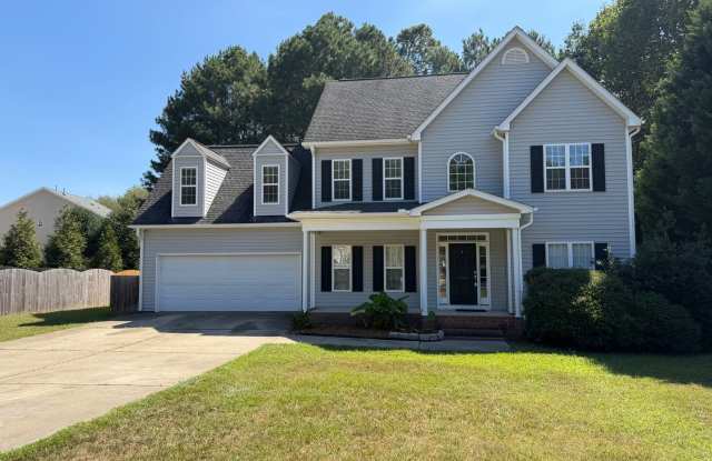 Gorgeous 4BD2/5 BA home with 2 car garage in popular Ballentine Subdivision in Fuquay Varina! Gallery 1