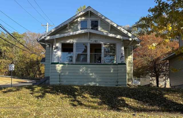 Charming 3-Bedroom Home with Enclosed Porch and Basement! photos photos