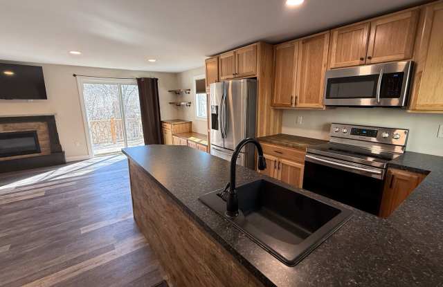 Modern 2-Bedroom Townhouse Condo – Water  Sewer Included! photos photos