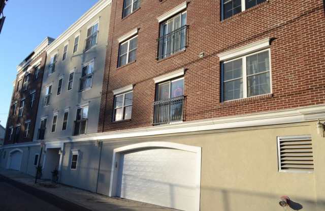 Pristine 1-Bedroom Apartment with Garage Parking in the Heart of Downtown Phoenixville – Available Now! photos photos