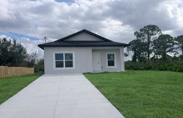 BRAND NEW 2 Bed- 2 Bath Pet-Friendly Retreat in Desirable Lehigh Acres! photos photos