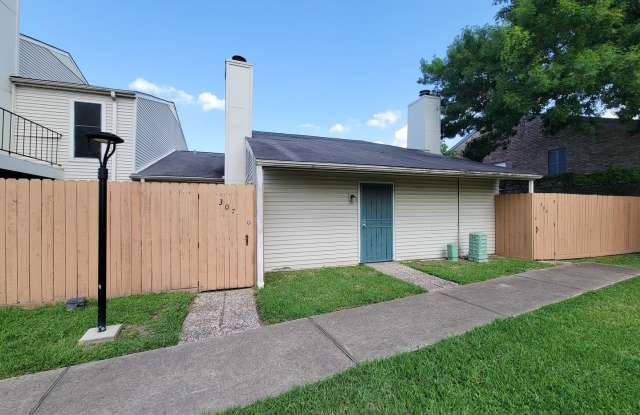 Spacious 2 Bed Condo with Vaulted Ceilings, Fireplace & Private Patios in Whisper Walk - 6401 Deihl Road, Houston, TX 77092