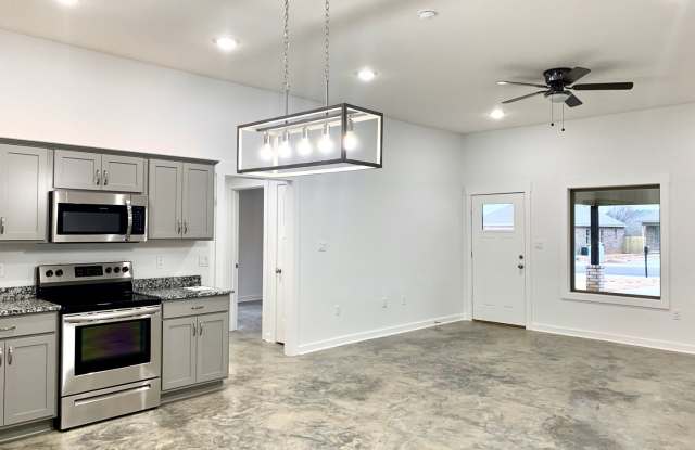 3 Bed, 2 Bath with Fenced Yard, Two-Car Carport, and Lawn Care Included Gallery 3