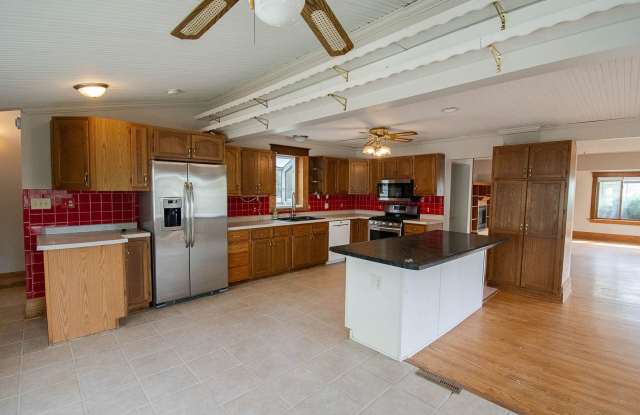 Bright, freshly painted home with HUGE garage space! photos photos