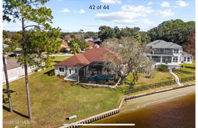 Live Like You're on Vacation Every Day! Stunning Riverfront Home with Unforgettable Sunsets! Gallery 4