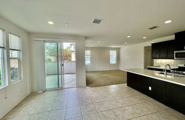 Spacious 4BR/3BA Townhome with Downstairs Bedroom & 2-Car Garage at Yorba Linda Gallery 4