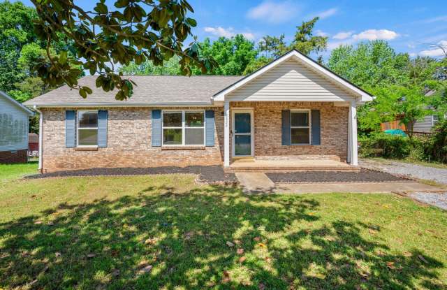 Charming Brick Ranch with Spacious Living Areas & Beautiful Bay Window Views! photos photos