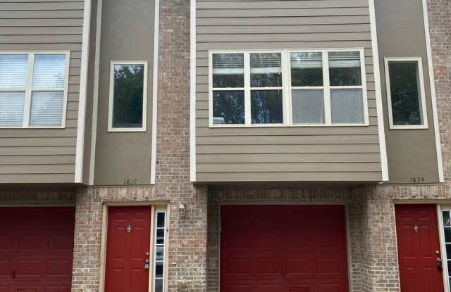 School Year Lease! 3 Bedrooms, 2.5 Bathrooms Townhouse near University of Arkansas - 1x Car Garage + All Appliances Provided! photos photos