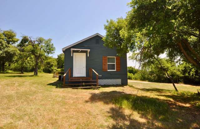 FOR LEASE - 1 BR - 1 BA Frame Home on Large Lot with Vinyl Plank Flooring, New HVAC System  Nice Storage Building. photos photos