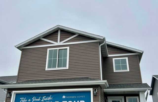 Spacious  Stylish 3-Bed Home with Modern Finishes and Attached 2-Stall Garage photos photos